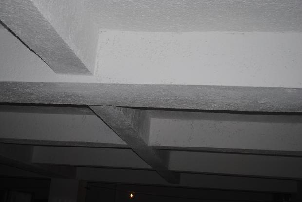 地下室顶棚喷的无机纤维保温层表面不太美观,