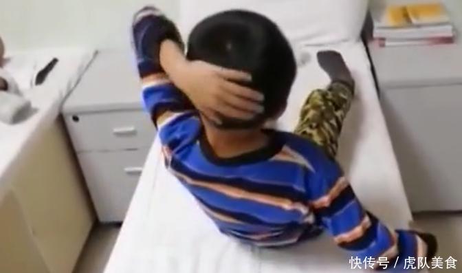 九岁小孩沉迷手机得歪脖子病 起身卧躺成问题
