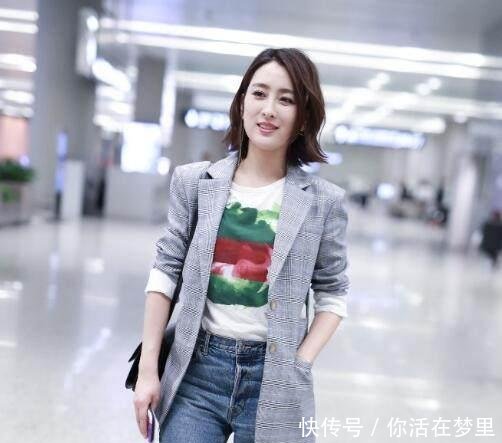 36岁马苏现身机场 一身中性打扮心情大好!浓妆