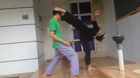 练过搏击的女子这么帅气，不仅能脚碎大石，而且一个旋风踢打趴男子！