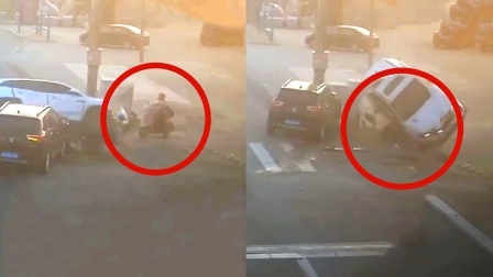 监拍：女子正好好等红灯 突遭”飞来“轿车砸中